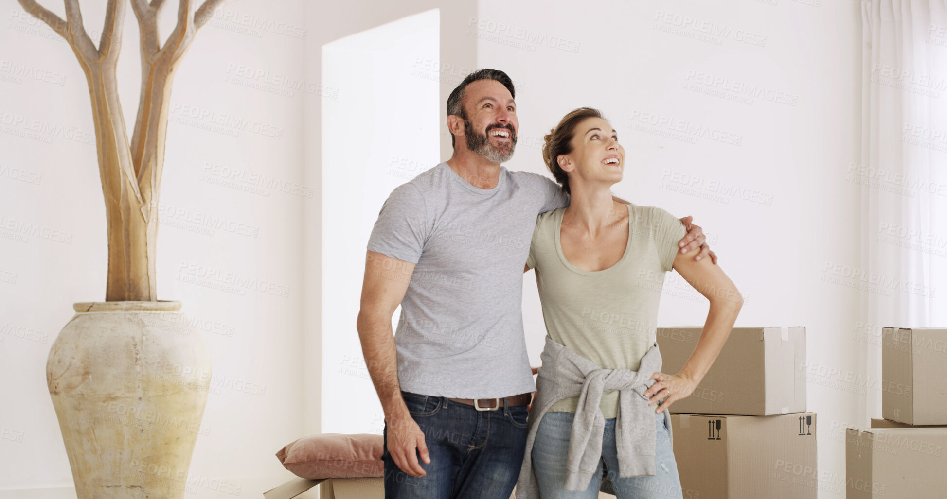 Buy stock photo New home, smile and couple hug for property investment, moving and mortgage loan. Mature man, woman and embrace for real estate with relocation, love and bonding together with partner in dream house