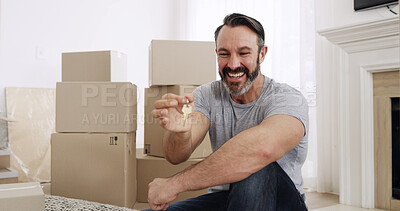 Buy stock photo Happy man, boxes and new home with keys for property purchase, investment or mortgage loan. Excited, male person or homeowner with smile, access or packages for fresh start, house or apartment sale