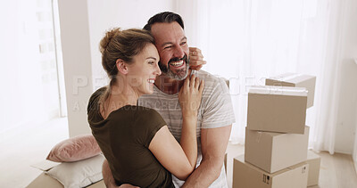 Buy stock photo New home, smile and couple hug for relocation, property investment or mortgage. Happy man, woman and embrace for moving with real estate loan, love or bonding together with partner in dream house