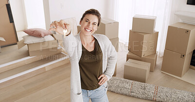 Buy stock photo Portrait, moving in and woman with key to new home for property ownership, investment and rent. Smile, person and show access to real estate for relocation, mortgage and house sale with landlord