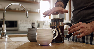 Buy stock photo Hands, man and french press for coffee in kitchen with morning routine, prepare beverage and latte. Home, plunger and person making espresso with filter for caffeine, drink and brewing process