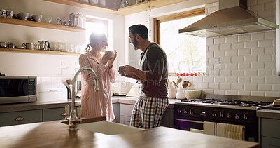 Buy stock photo Laugh, smile and happy couple with coffee in kitchen for bonding, connection or conversation together. Flare, love and man with woman for morning, caffeine beverage and communication or chat in home
