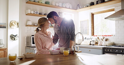 Buy stock photo Breakfast, love and couple in kitchen with smile, connection and bonding in healthy marriage. Romantic, morning or people in home together with flare, meal prep or nutrition for happy relationship.