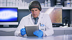 Man, scientist and check tablet in lab for medical research, microbiology study and hairnet for hygiene. Science, ppe for safety and mature male doctor with digital results for healthcare innovation