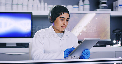 Buy stock photo Woman, scientist and check tablet in lab for medical research, microbiology study and hairnet for hygiene. Science, ppe for safety and female doctor with digital results for healthcare innovation