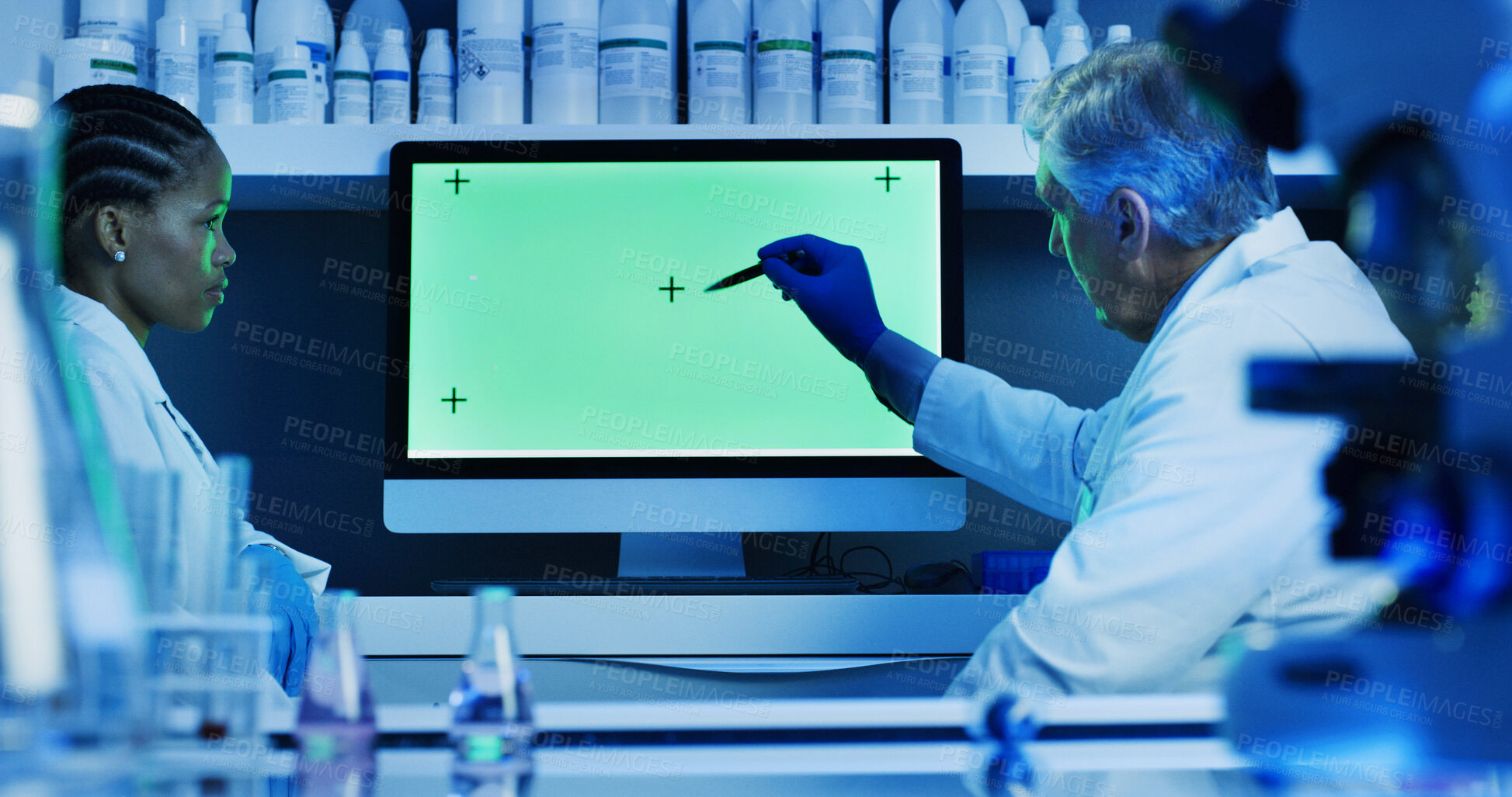 Buy stock photo Lab, scientists and people with green screen, pointing and teamwork for project or medical research. Collaboration, biologist and explaining disease to coworker, talk and cell analysis on computer