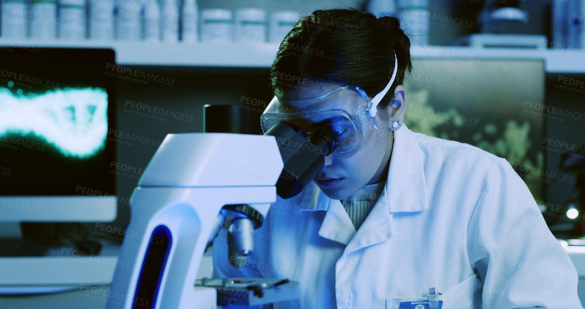 Buy stock photo Scientist, woman or microscope analysis in lab for DNA sample, microbiology experiment or study. Blue light, genetic science or person with equipment for medical research, biotechnology or innovation