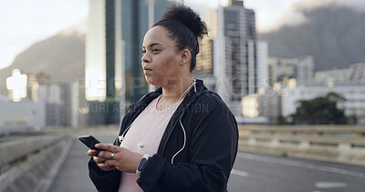 Buy stock photo Plus size woman, phone and exercise in city with thinking, reflection or break for inspiration on bridge. Person, runner and smartphone with app for training stats, routine and weight loss in Brazil