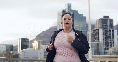 Buy stock photo Running, earphones and plus size woman in city for workout playlist, cardio challenge and health. Weight loss, exercise and streaming with person outdoor for training, space and fitness music