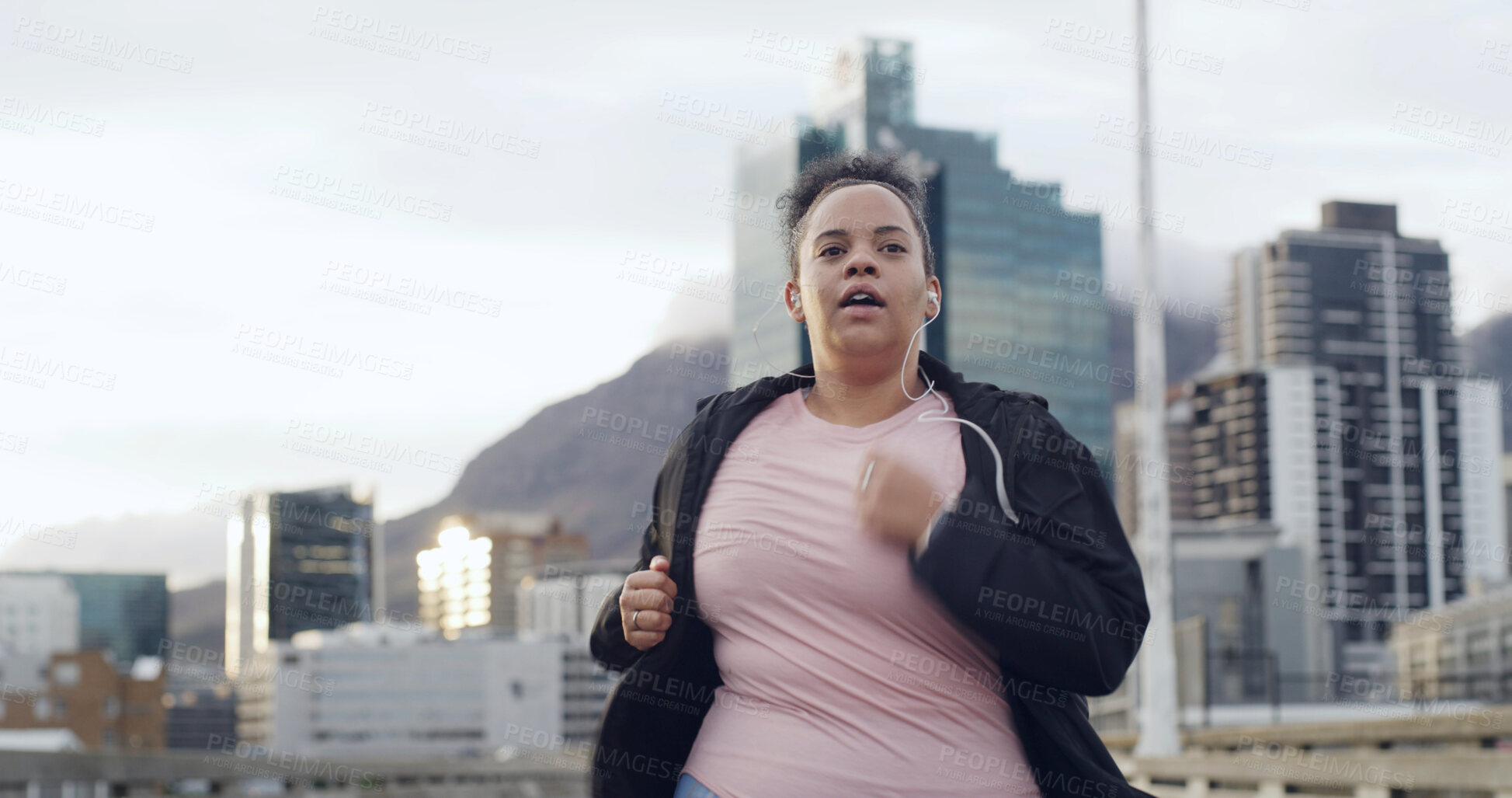 Buy stock photo Running, earphones and plus size woman in city for workout playlist, cardio challenge and health. Weight loss, exercise and streaming with person outdoor for training, space and fitness music