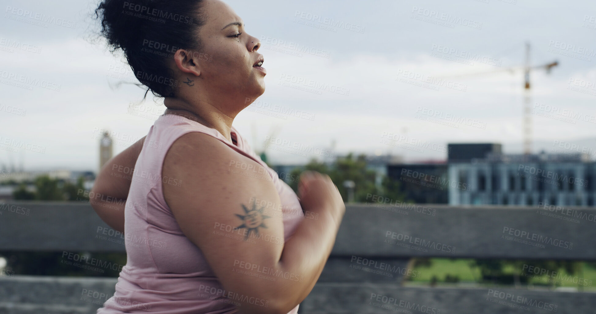 Buy stock photo Profile, running and woman with fitness, cardio and training with urban town, workout and wellness. Lose weight, healthy person and runner in street, endurance and practice with exercise or breathing