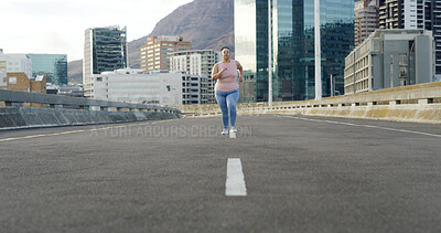 Buy stock photo Running, road and plus size woman in city for workout, cardio challenge and health. Weight loss, exercise and wellness with female runner or person outdoor in street for training, sports and fitness