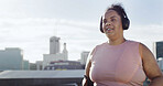 Woman, city and running with headphones for fitness, space for wellness with radio and cardio health outdoor. Female runner, lose weight and listening to podcast training or workout in urban town