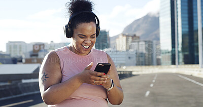 Buy stock photo Headphones, fitness and happy woman with phone in city for audio, podcast or motivation playlist. Sports, mobile and plus size person outdoor with radio online, exercise music or weight loss results