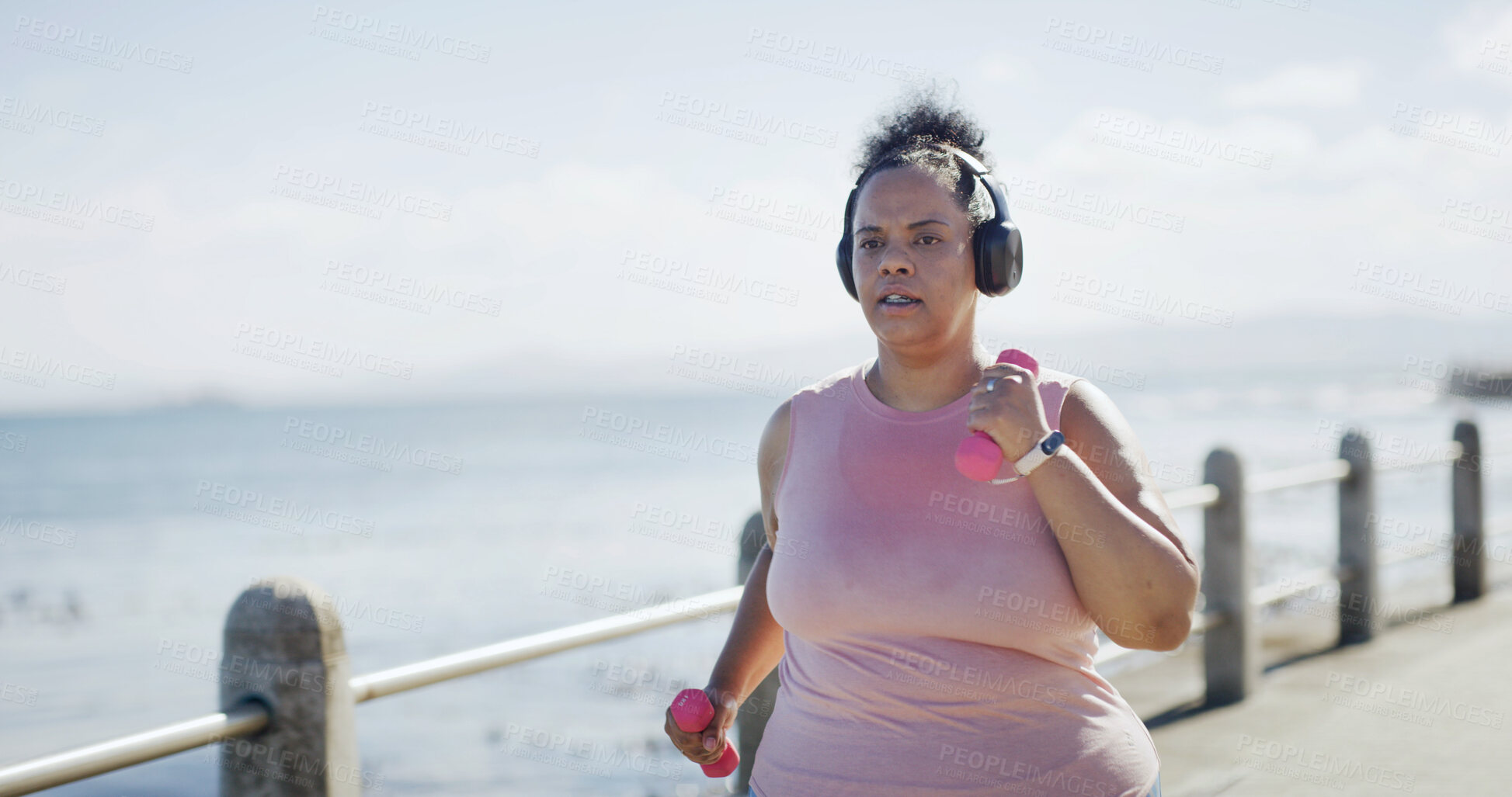 Buy stock photo Training, headphones and woman by beach with music, podcast or running for fitness. Sports, audio and plus size athlete to lose weight with radio, cardio and exercise or workout outdoor with space