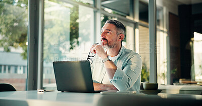 Buy stock photo Thinking, laptop and businessman in office with research for finance report with company budget. Technology, ideas and mature male financial manager with computer for investment proposal in workplace