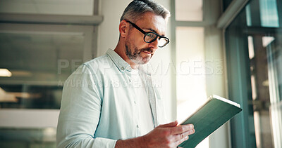Buy stock photo Tablet, reading and businessman in office with research for finance report with budget plan. Digital technology, professional and mature male financial manager with ideas for investment proposal.