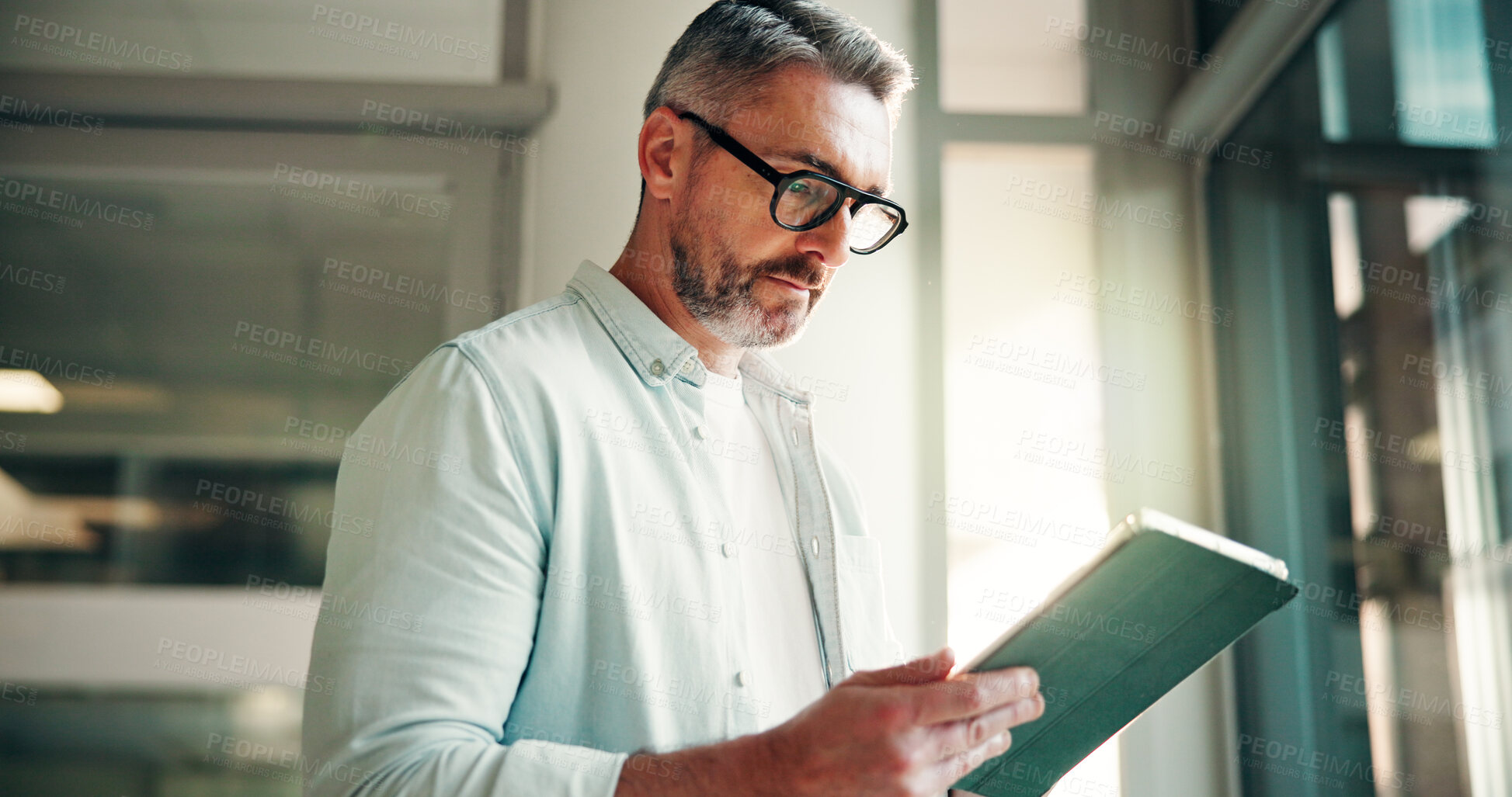 Buy stock photo Tablet, reading and businessman in office with research for finance report with budget plan. Digital technology, professional and mature male financial manager with ideas for investment proposal.