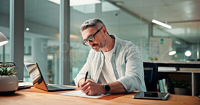 Buy stock photo Writing, planning and documents with business man in office for budget research, laptop and graph. Profit chart, account review and paperwork with mature person for finance, balance and growth