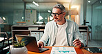 Business, charts and man with laptop, night and documents with planning, investment and email. Mature person, evening and employee in office, pc and graphs with trading, funding proposal and report 