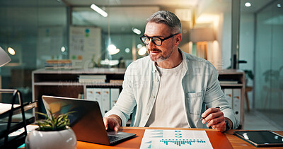 Business, charts and man with laptop, night and documents with planning, investment and email. Mature person, evening and employee in office, pc and graphs with trading, funding proposal and report 