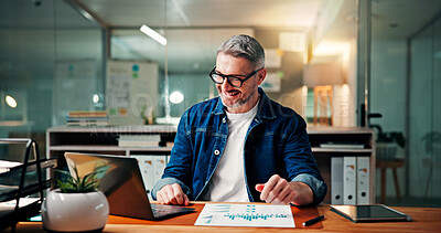 Business, charts and man with laptop, night and documents with planning, investment and email. Mature person, evening or employee with smile, pc and graphs with trading, sales report or website info
