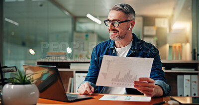 Buy stock photo Mature, happy man and night with laptop for video call, online meeting or report in office. Male person, financial advisor or working late with statistics, documents or graph for webinar in workplace