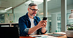 Phone, happy and business man in office for social media break, typing message and email. Creative, professional and mature worker on smartphone for internet, website and online research at desk