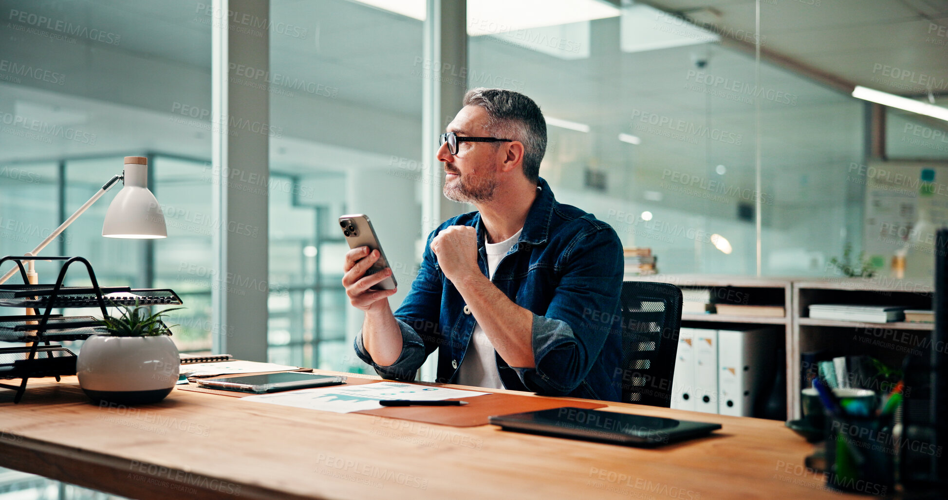 Buy stock photo Thinking, phone and planning with business man in office for social media manager, reflection and contact. Campaign marketing, vision and networking with mature person in creative agency for text 