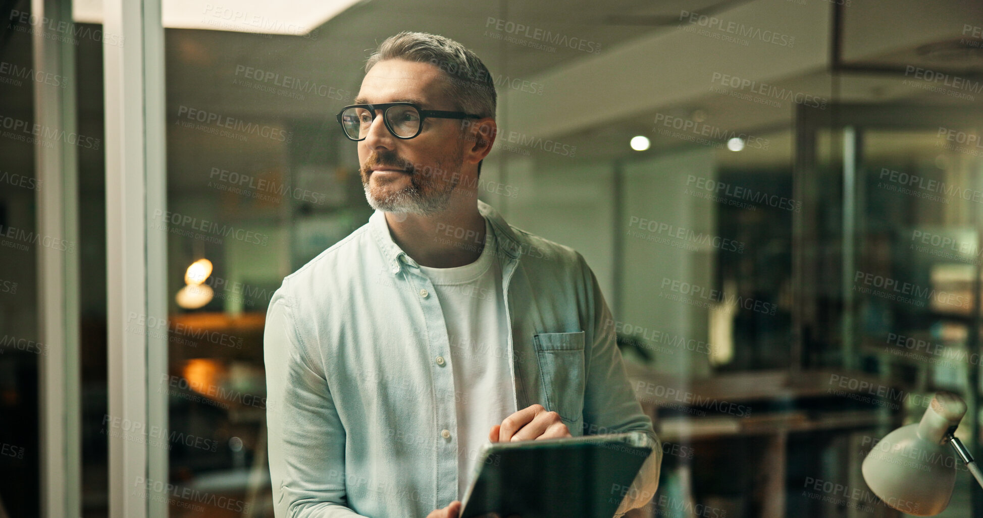 Buy stock photo Thinking, night and business man on tablet for project ideas, planning and solution by window. Working late, creative and mature person with inspiration on tech for research, proposal and website