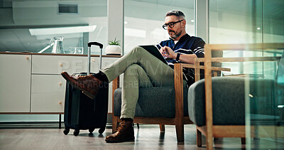 Buy stock photo Man, office or planning with tablet or suitcase for business travel, work trip or online booking. Mature, male person or employee thinking with technology or luggage for commute or flight delay