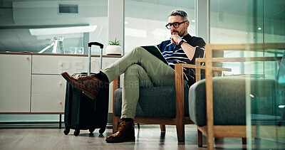 Buy stock photo Man, business or planning with tablet or suitcase for travel, work trip or online booking in office. Mature, male person or employee thinking with technology or luggage for commute or flight delay
