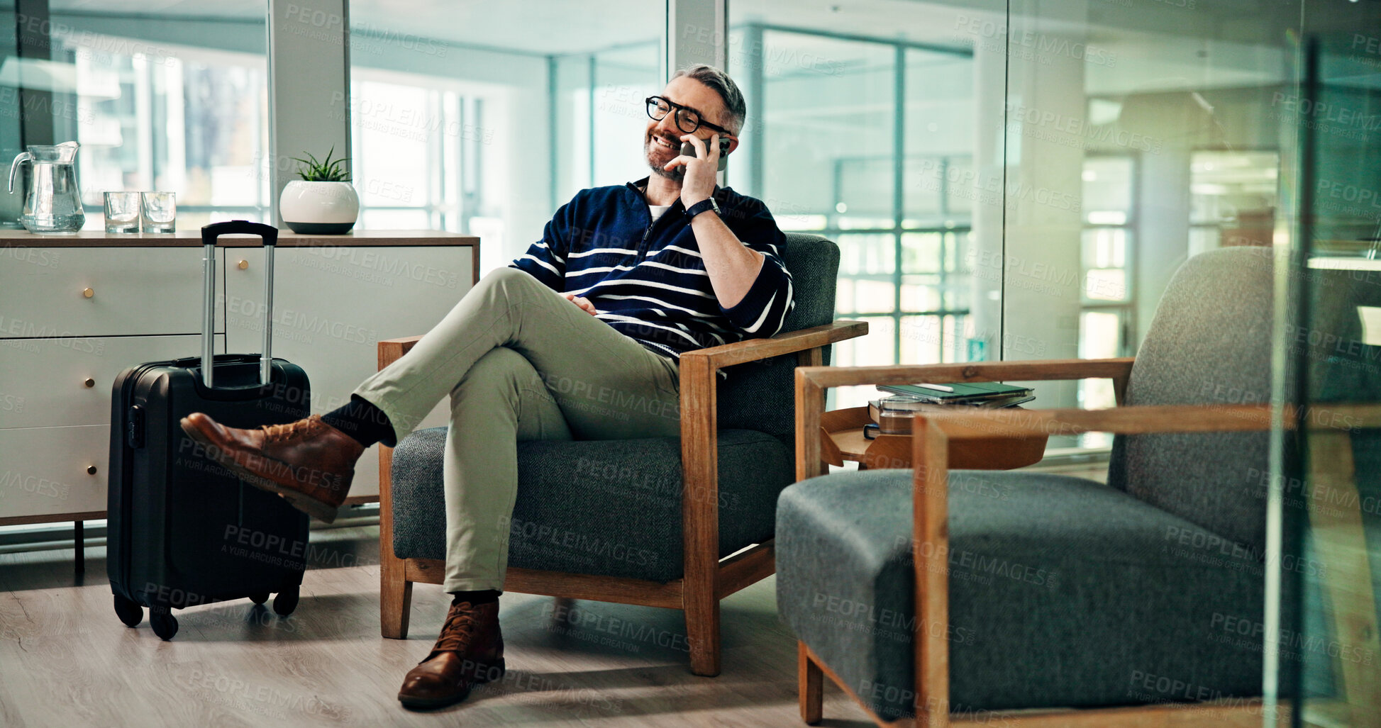 Buy stock photo Phone call, travel and man in airport lounge for professional contact, flight schedule and luggage. Communication, layover update and business trip with mature person in vip lobby with suitcase