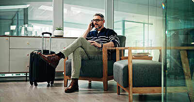 Buy stock photo Phone call, entrepreneur and man in airport, business travel or discussion for flight update or chat. Talking, CEO and mature person with suitcase in waiting room, international trip and opportunity