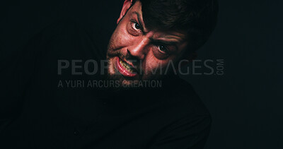 Buy stock photo Portrait, angry or man in studio for mental health, schizophrenia or anxiety. Face, bipolar disorder or person with depression, stress or frustrated with rage for psychology on black background space