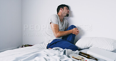 Buy stock photo Addiction, man and drugs with alcohol on bed with anxiety, psychosis and loss of appetite. Mockup space, person with depression or stress in home from opioid abuse, pharmaceutical narcotics or crisis