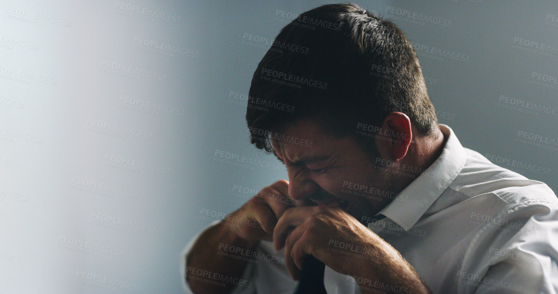 Buy stock photo Upset, employee and man with depression, home and frustration for job loss, space and mental health. Unhappy, person and anxious for unemployment, dismissal or fired from work and financial crisis