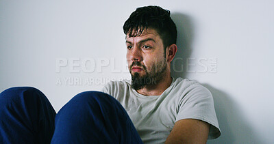 Buy stock photo Thinking, man and anxiety with withdrawal at house of drug addiction, substance abuse and solitude. Bipolar, male person and insomnia symptoms for detox, mental breakdown and insolation for recovery