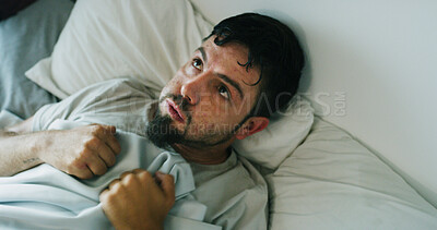 Buy stock photo Insomnia, man and anxiety from drug addiction in bed with withdrawal symptoms, restless or craving. Above, person with depression and thinking in home with stress for substance abuse detox or nervous