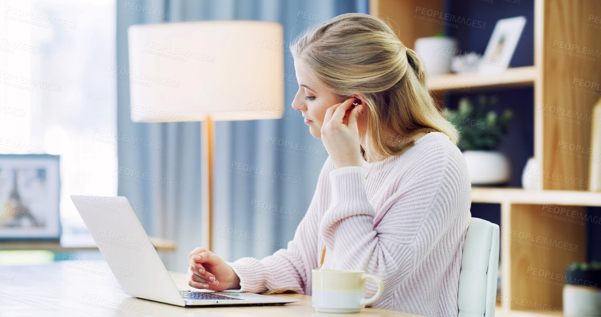 Buy stock photo Woman, student and earphones with laptop in home, audio and virtual class for online course. Girl, computer and e learning for education, development and study with college assessment at house