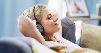 Buy stock photo Relax, headphones and peace with woman on sofa for streaming service, guided meditation and white noise. Zen radio, subscription and mindfulness with person in living room of home for wellness