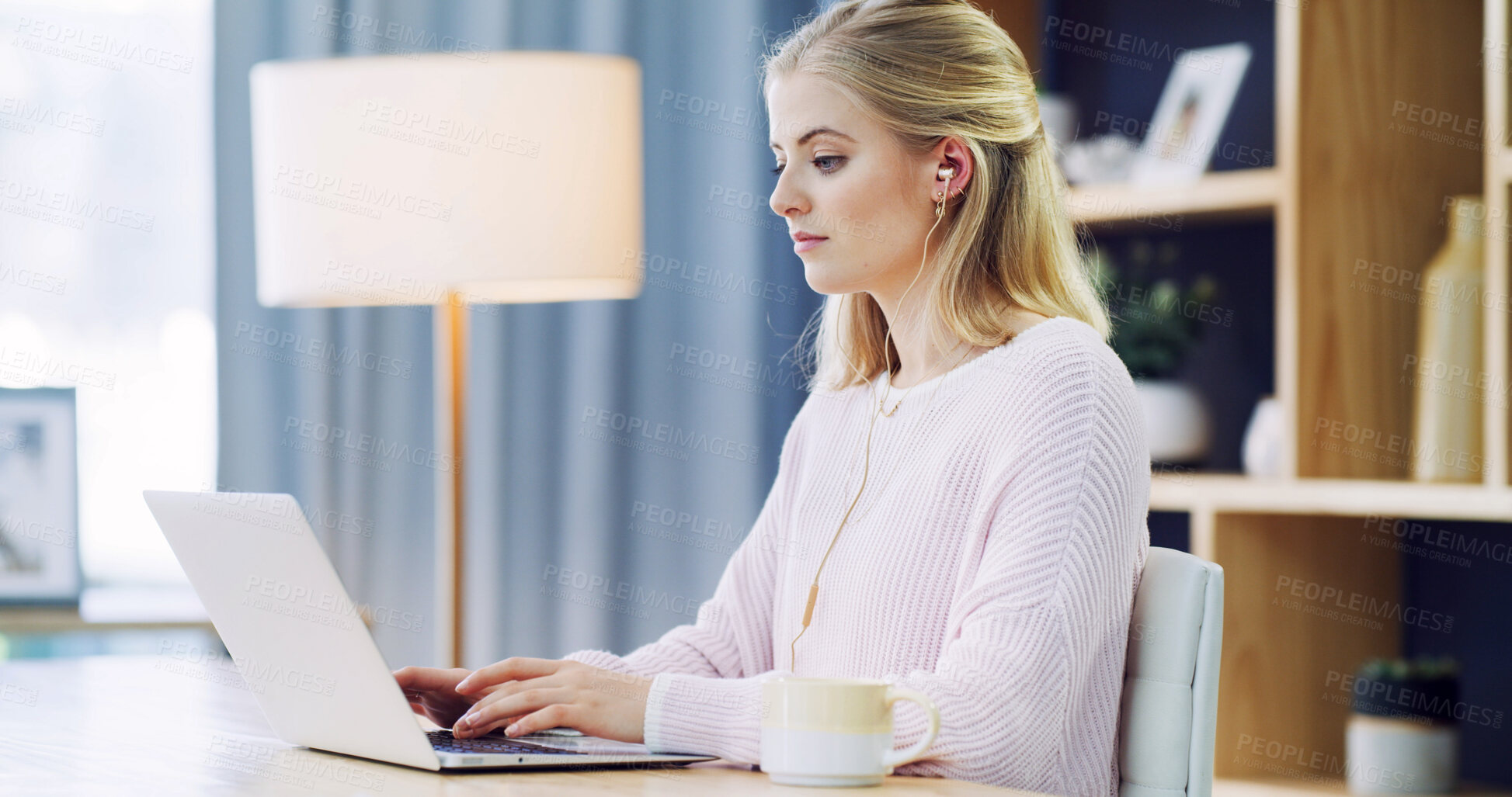Buy stock photo Laptop, education and earphones with woman in home office for elearning, study and blog. Typing, online class and college with female student for virtual, streaming and subscription and research