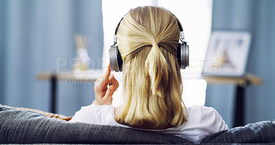 Buy stock photo Back, headphones and peace with woman on sofa for streaming service, guided meditation and white noise. Zen radio, subscription and mindfulness with person in living room of home for wellness