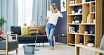 Girl, cleaning and singing with headphones in home, broom and happy with streaming in living room. Woman, excited and listen to music with audio subscription, karaoke or voice for chores at house