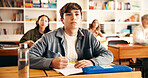High school students, boy or listening in lesson for learning, curriculum knowledge or information. Teenager, people and attention with paper in classroom for exam feedback, scholarship and education