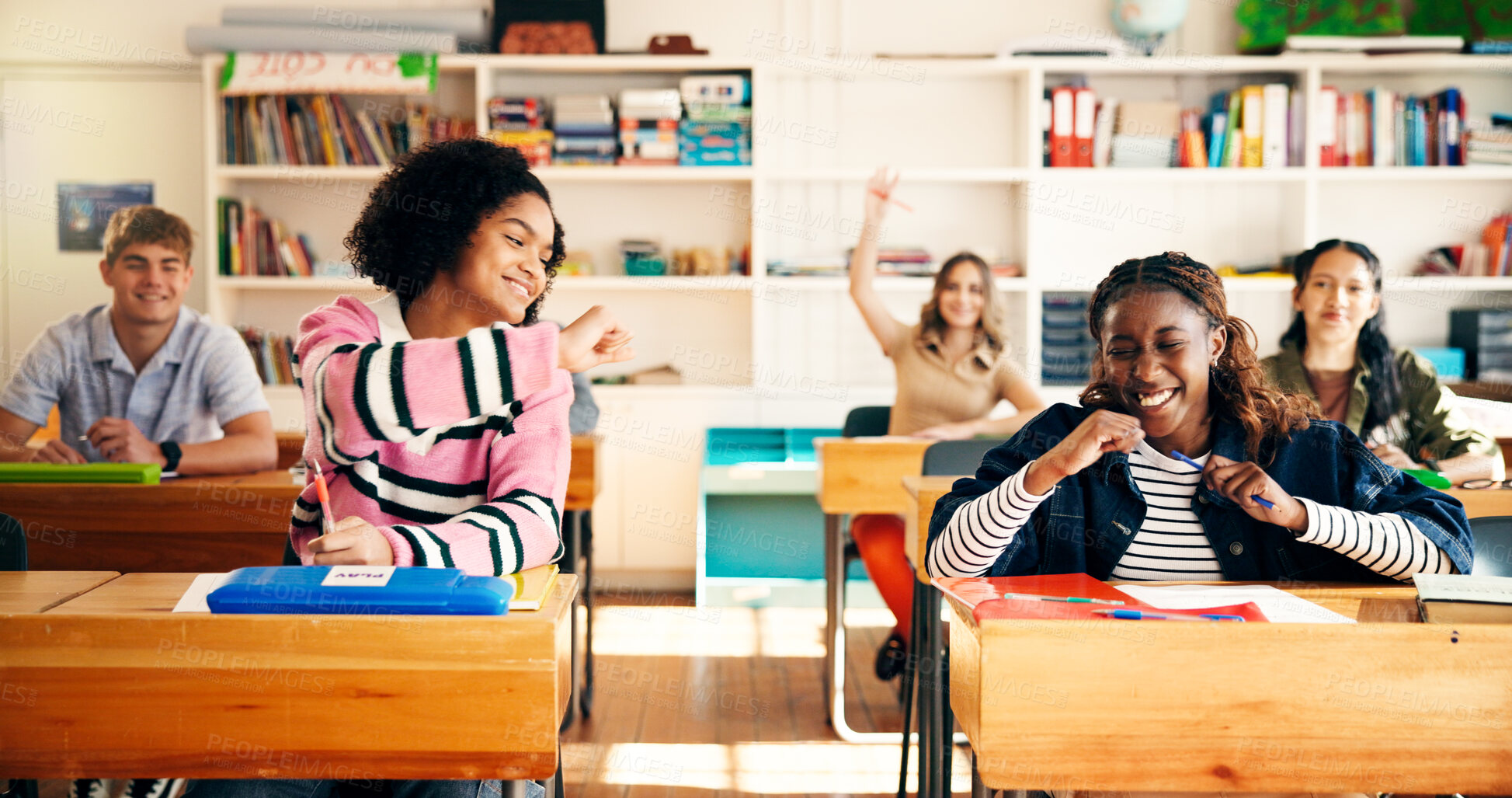 Buy stock photo Girl, teenager and celebration in classroom for education, development or answer for quiz at high school. Pupil, group and happy with fist pump, scholarship and excited for learning goals at academy