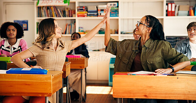 Buy stock photo High five, education and teenagers in classroom at school for learning, teamwork and celebration. Happy, support and students with collaboration on assignment, test or exam answers at campus.