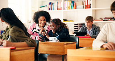 Buy stock photo High school, success and happy friends with phone in classroom for exam results or online report. Teenager, mobile or girls together for education, good news or students check scholarship application