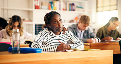 Buy stock photo Learning, classroom and girl writing notes in high school for test, education or academic knowledge. Teen students, lesson or study in academy for assessment, scholarship exam or quiz for development