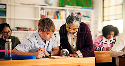 Buy stock photo Teacher, learning and help student in high school for assignment, explain info and knowledge. Assistance, writing and educator teaching teen boy for development, assessment and exam question in class